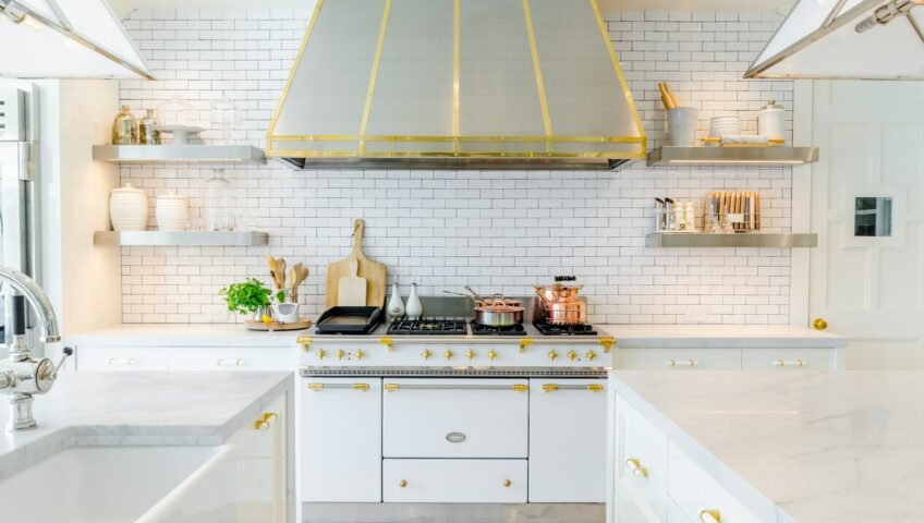 white kitchen cabinet near white stove oven
